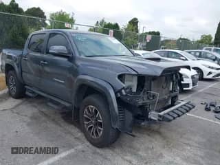2022 Toyota Tacoma SR with VIN 3TMCZ5AN6NM491351, listed as a IAAI auction lot 42140198 with 33,051 mi miles and . Bid and sale history available at DreamBid. Image 1.