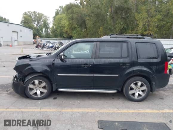 2013 Honda Pilot Touring with VIN 5FNYF4H97DB047819, listed as a IAAI auction lot 43299908 with 253,413 mi miles and . Bid and sale history available at DreamBid. Image 14.