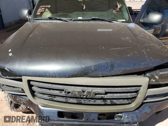 2003 GMC Sierra 1500 SLE z VIN 2GTEC19V831300489, wystawiony jako Copart lot #82320705 z przebiegiem 146 528 mil mil oraz Szkoda całkowita • Salvage title. Historia ofert i sprzedaży dostępna na DreamBid. Obrazek 11.