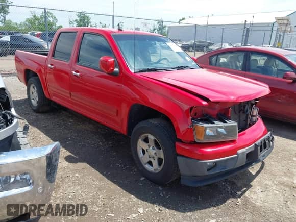 2012 Chevrolet Colorado 1LT with VIN 1GCDSCF94C8112521, listed as a IAAI auction lot 42301468 with 101,537 mi miles and . Bid and sale history available at DreamBid. Image 1.