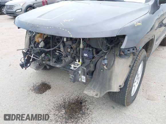 2017 Jeep Grand Cherokee Altitude with VIN 1C4RJFAG9HC901963, listed as a IAAI auction lot 42288950 with 99,248 mi miles and . Bid and sale history available at DreamBid. Image 18.