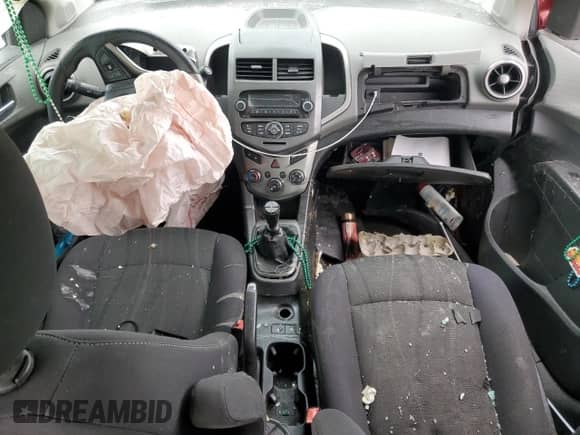 2012 Chevrolet Sonic LT с VIN 1G1JD5SH7C4141873, выставлен на аукционе Copart как лот 57967235 с пробегом Не указан миль и Списание • Salvage title. История ставок и продаж доступна на DreamBid. Изображение 8.