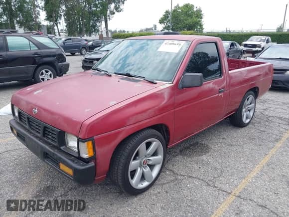 1994 Nissan Frontier with VIN 1N6SD11S3RC356695, listed as a IAAI auction lot 42408659 with 187,376 mi miles and . Bid and sale history available at DreamBid. Image 2.