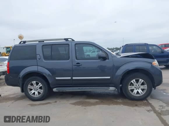 2011 Nissan Pathfinder LE with VIN 5N1AR1NN7BC622435, listed as a IAAI auction lot 41560938 with 118,547 mi miles and . Bid and sale history available at DreamBid. Image 13.