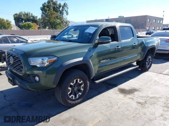 2021 Toyota Tacoma SR5 z VIN 3TMDZ5BN8MM114649, wystawiony jako IAAI lot #43493615 z przebiegiem 63 288 mil mil oraz . Historia ofert i sprzedaży dostępna na DreamBid. Obrazek 18.