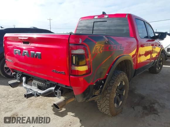 2022 Ram 1500 Rebel z VIN 1C6SRFLT9NN307014, wystawiony jako IAAI lot #41680604 z przebiegiem 45 214 mil mil oraz . Historia ofert i sprzedaży dostępna na DreamBid. Obrazek 4.