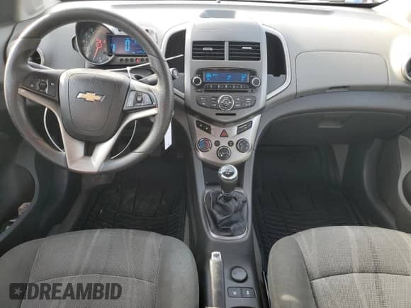 2012 Chevrolet Sonic LT с VIN 1G1JD5SHXC4140426, выставлен на аукционе Copart как лот 82801084 с пробегом 149 429 миль миль и Списание • Salvage title. История ставок и продаж доступна на DreamBid. Изображение 8.