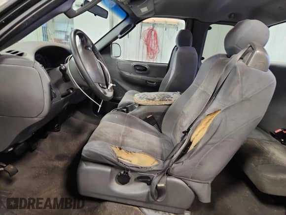 2003 Ford F-150 XL with VIN 2FTRX172X3CA42415, listed as a Copart auction lot 70556985 with 227,798 mi miles and Clean title. Bid and sale history available at DreamBid. Image 7.