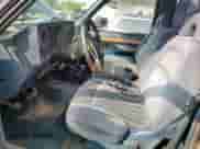 1989 GMC Sierra 1500 с VIN 1GTDK14K4KZ527373, выставлен на аукционе Copart как лот 71645095 с пробегом 244 054 миль миль и Списание • Salvage title. История ставок и продаж доступна на DreamBid. Изображение 7.