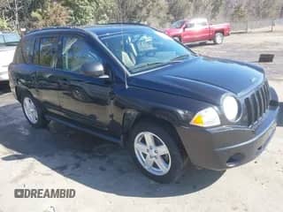 2010 Jeep Compass Sport z VIN 1J4NT1FB1AD624776, wystawiony jako IAAI lot #41571247 z przebiegiem 172 799 mil mil oraz . Historia ofert i sprzedaży dostępna na DreamBid. Obrazek 1.