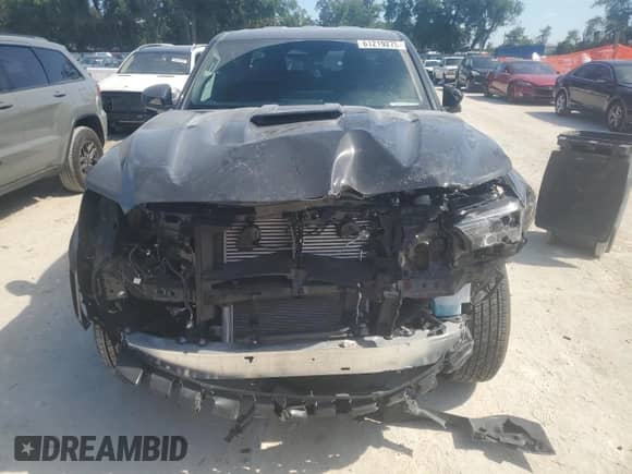 2024 Toyota Tacoma SR5 with VIN 3TMKB5FN5RM020760, listed as a Copart auction lot 61219275 with 4,143 mi miles and Non repairable. Bid and sale history available at DreamBid. Image 5.
