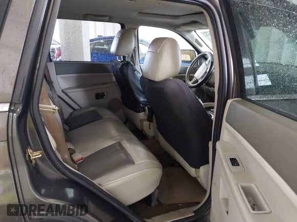 2006 Jeep Grand Cherokee Limited with VIN 1J4HR58N16C310410, listed as a IAAI auction lot 43194311 with 183,594 mi miles and . Bid and sale history available at DreamBid. Image 8.