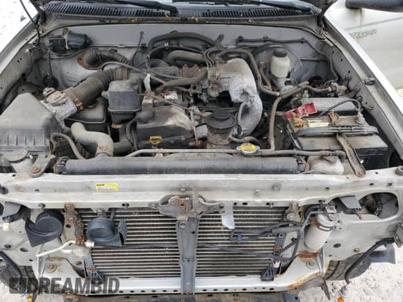 2002 Toyota Tacoma с VIN 5TEWM72NX2Z029735, выставлен на аукционе Copart как лот 90379695 с пробегом 160 421 миль миль и Чистый • Clean title. История ставок и продаж доступна на DreamBid. Изображение 11.