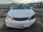 2004 Toyota Camry LE с VIN 4T1BE32K64U267177, выставлен на аукционе Copart как лот 82574475 с пробегом 270 936 миль миль и Списание • Salvage title. История ставок и продаж доступна на DreamBid. Изображение 5.