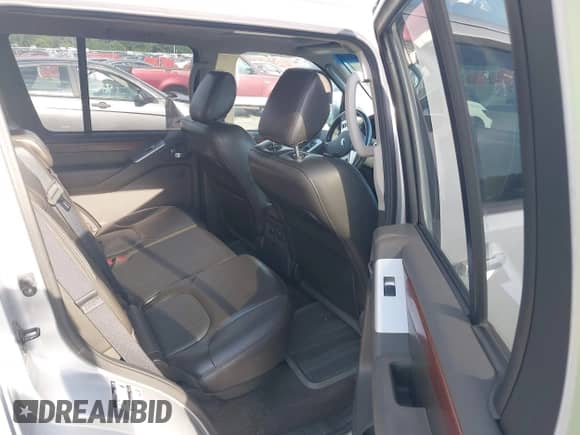 2011 Nissan Pathfinder LE with VIN 5N1AR1NB9BC602600, listed as a IAAI auction lot 42738623 with 197,331 mi miles and . Bid and sale history available at DreamBid. Image 8.