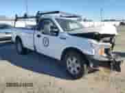 2019 Ford F-150 XL with VIN 1FTNF1C43KKE41153, listed as a Copart auction lot 84074044 with 179,684 mi miles and Salvage title. Bid and sale history available at DreamBid. Image 4.