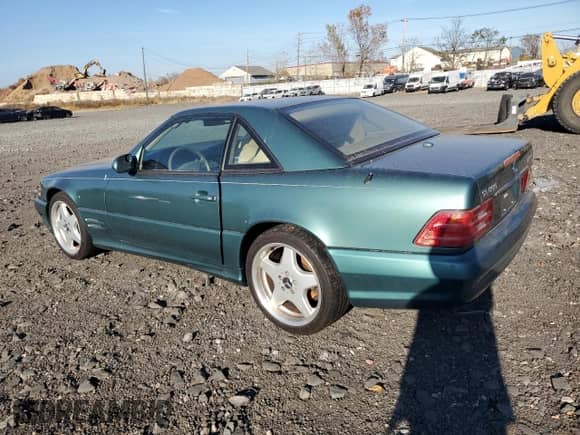 2002 Mercedes-Benz SL 500 with VIN WDBFA68F42F204673, listed as a Copart auction lot 79391964 with Not provided miles and Salvage title. Bid and sale history available at DreamBid. Image 2.