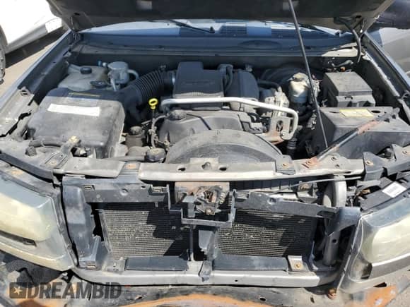 2005 Chevrolet TrailBlazer LT с VIN 1GNDT13S052333796, выставлен на аукционе Copart как лот 71474165 с пробегом 186 871 миль миль и Списание • Salvage title. История ставок и продаж доступна на DreamBid. Изображение 12.