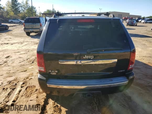 2009 Jeep Grand Cherokee with VIN 1J8HR68T19C550936, listed as a Copart auction lot 80090724 with 113,543 mi miles and Salvage title. Bid and sale history available at DreamBid. Image 6.