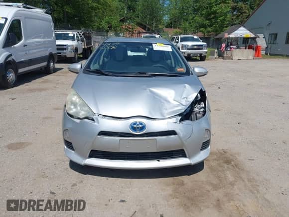 2012 Toyota Prius One with VIN JTDKDTB36C1014067, listed as a IAAI auction lot 42396008 with 171,889 mi miles and . Bid and sale history available at DreamBid. Image 13.