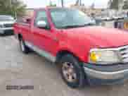 1999 Ford F-150 z VIN 1FTRF17W6XNA49190, wystawiony jako IAAI lot #43396326 z przebiegiem Nie podano mil oraz . Historia ofert i sprzedaży dostępna na DreamBid. Obrazek 6.