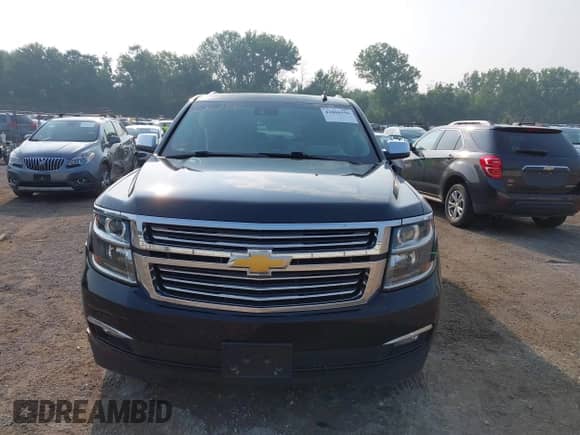 2015 Chevrolet Suburban LTZ z VIN 1GNSKKKC5FR155127, wystawiony jako IAAI lot #42868596 z przebiegiem Nie podano mil oraz . Historia ofert i sprzedaży dostępna na DreamBid. Obrazek 12.