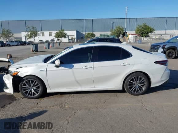 2021 Toyota Camry Hybrid XLE with VIN 4T1F31AK3MU567000, listed as a IAAI auction lot 43279629 with 132,796 mi miles and . Bid and sale history available at DreamBid. Image 14.