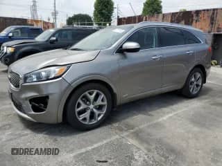 2017 Kia Sorento SXL z VIN 5XYPKDA52HG230638, wystawiony jako Copart lot #68787145 z przebiegiem 93 497 mil mil oraz Szkoda całkowita • Salvage title. Historia ofert i sprzedaży dostępna na DreamBid. Obrazek 1.