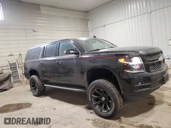 2020 Chevrolet Suburban LS with VIN 1GNSKGKC0LR103462, listed as a Copart auction lot 45928735 with 73,447 mi miles and Clean title. Bid and sale history available at DreamBid. Image 4.