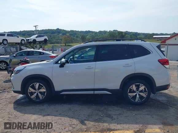 2020 Subaru Forester Touring with VIN JF2SKAXC3LH589349, listed as a IAAI auction lot 43154603 with 112,484 mi miles and . Bid and sale history available at DreamBid. Image 14.