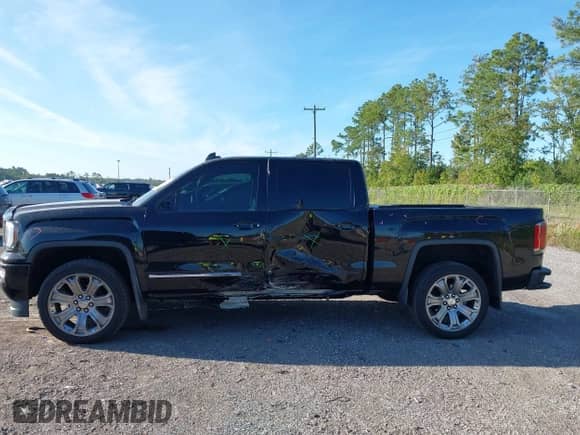 2017 GMC Sierra 1500 Denali with VIN 3GTU2PEJ0HG104940, listed as a IAAI auction lot 43322034 with 96,189 mi miles and . Bid and sale history available at DreamBid. Image 14.