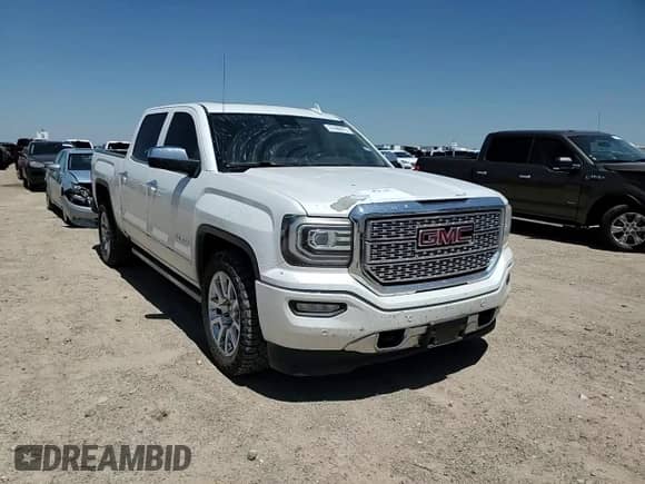 2016 GMC Sierra 1500 Denali z VIN 3GTU2PEJ1GG371793, wystawiony jako Copart lot #67460875 z przebiegiem 231 730 mil mil oraz Czysty tytuł • Clean title. Historia ofert i sprzedaży dostępna na DreamBid. Obrazek 13.