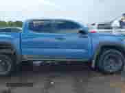 2018 Toyota Tacoma SR with VIN 5TFCZ5AN6JX162962, listed as a IAAI auction lot 42811440 with 74,189 mi miles and . Bid and sale history available at DreamBid. Image 13.