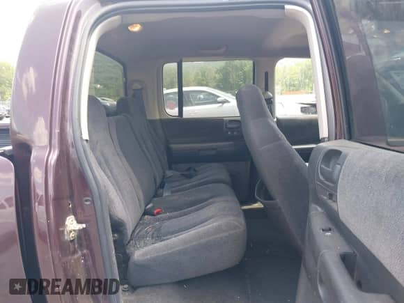 2004 Dodge Dakota SLT with VIN 1D7HG48NX4S649522, listed as a IAAI auction lot 42580132 with 124,037 mi miles and . Bid and sale history available at DreamBid. Image 8.