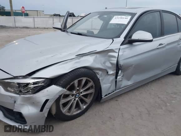 2018 BMW 3 Series 320i with VIN WBA8A9C51JAH12024, listed as a IAAI auction lot 43198146 with 98,143 mi miles and . Bid and sale history available at DreamBid. Image 6.