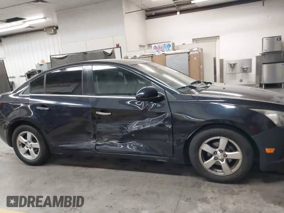 2014 Chevrolet Cruze LTZ с VIN 1G1PG5SB2E7113462, выставлен на аукционе IAAI как лот 43412951 с пробегом 133 666 миль миль и . История ставок и продаж доступна на DreamBid. Изображение 13.