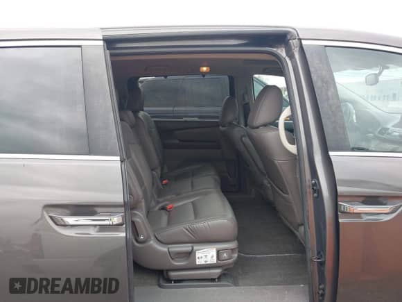 2013 Honda Odyssey EX-L with VIN 5FNRL5H64DB091298, listed as a IAAI auction lot 43589167 with 283,092 mi miles and . Bid and sale history available at DreamBid. Image 8.