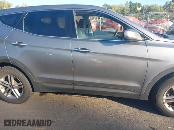 2017 Hyundai Santa Fe 2.4L z VIN 5XYZTDLBXHG441059, wystawiony jako IAAI lot #43284375 z przebiegiem 130 841 mil mil oraz . Historia ofert i sprzedaży dostępna na DreamBid. Obrazek 13.