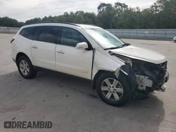 2014 Chevrolet Traverse LT с VIN 1GNKRGKD2EJ319951, выставлен на аукционе Copart как лот 84435595 с пробегом 123 719 миль миль и Списание • Salvage title. История ставок и продаж доступна на DreamBid. Изображение 4.