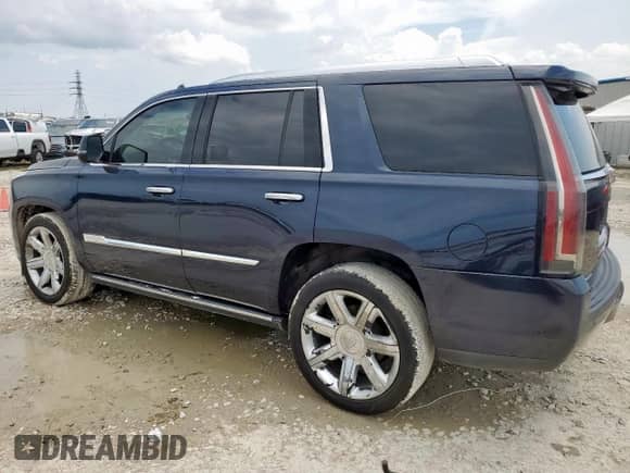 2017 Cadillac Escalade Premium Luxury z VIN 1GYS4CKJ7HR143999, wystawiony jako Copart lot #69984655 z przebiegiem 151 847 mil mil oraz Czysty tytuł • Clean title. Historia ofert i sprzedaży dostępna na DreamBid. Obrazek 2.