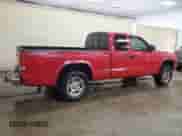 2003 Dodge Dakota с VIN 1D7HG42X23S296122, выставлен на аукционе Copart как лот 66366265 с пробегом 240 253 миль миль и Списание • Salvage title. История ставок и продаж доступна на DreamBid. Изображение 3.