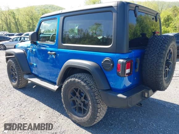 2022 Jeep Wrangler Sport S with VIN 1C4GJXAG0NW145642, listed as a IAAI auction lot 42112670 with 8,737 mi miles and . Bid and sale history available at DreamBid. Image 3.