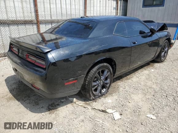 2023 Dodge Challenger SXT с VIN 2C3CDZGG2PH518548, выставлен на аукционе Copart как лот 59813475 с пробегом 72 661 миль миль и Списание • Salvage title. История ставок и продаж доступна на DreamBid. Изображение 3.