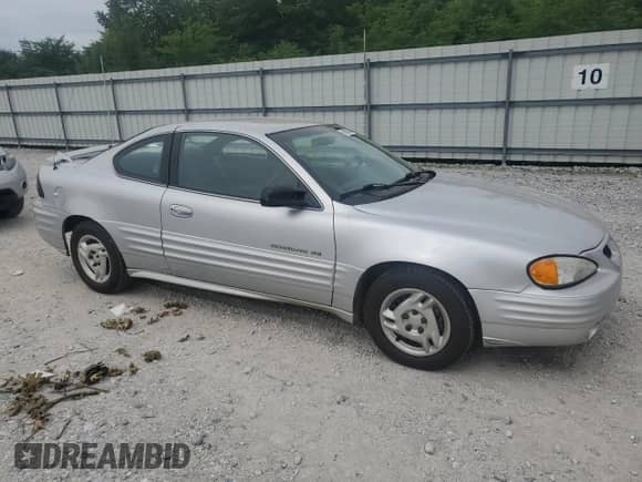 2001 Pontiac Grand Am с VIN 1G2NE12TX1M668035, выставлен на аукционе Copart как лот 59700585 с пробегом 60 965 миль миль и Списание • Salvage title. История ставок и продаж доступна на DreamBid. Изображение 4.
