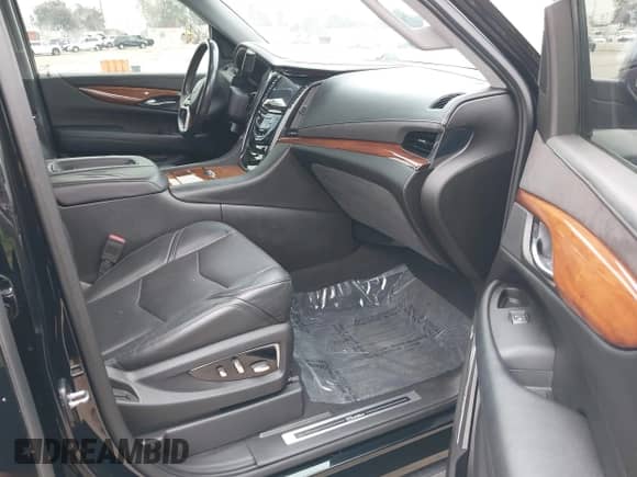 2015 Cadillac Escalade ESV Premium z VIN 1GYS4TKJ2FR554336, wystawiony jako IAAI lot #42575693 z przebiegiem 45 606 mil mil oraz . Historia ofert i sprzedaży dostępna na DreamBid. Obrazek 5.