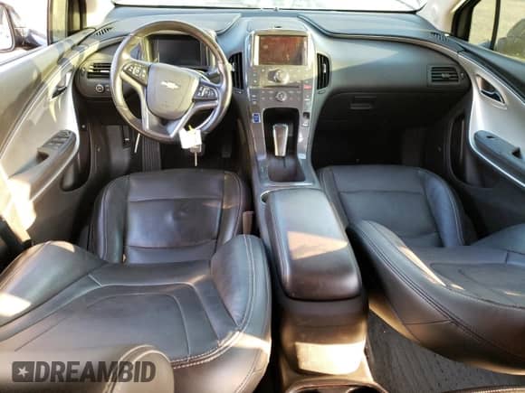 2015 Chevrolet Volt z VIN 1G1RD6E47FU132158, wystawiony jako Copart lot #38752214 z przebiegiem 132 884 mil mil oraz . Historia ofert i sprzedaży dostępna na DreamBid. Obrazek 8.