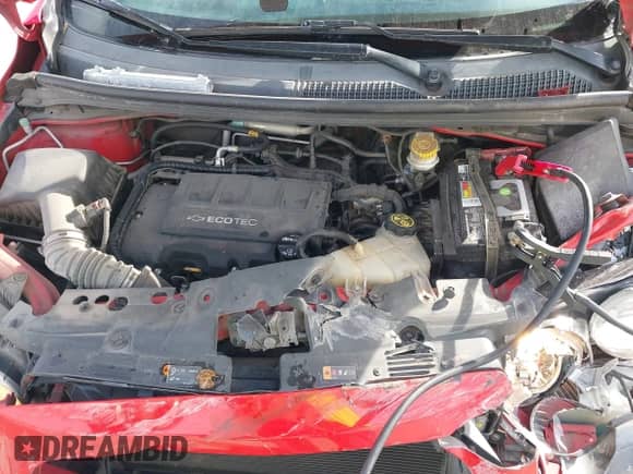 2016 Chevrolet Sonic RS z VIN 1G1JG6SB6G4168724, wystawiony jako IAAI lot #41363232 z przebiegiem 99 818 mil mil oraz . Historia ofert i sprzedaży dostępna na DreamBid. Obrazek 10.