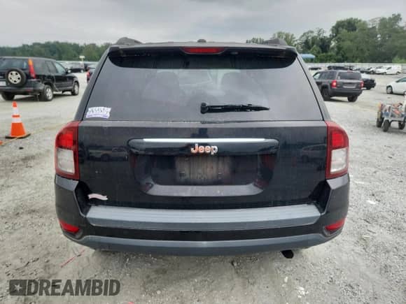 2014 Jeep Compass Sport с VIN 1C4NJCBA7ED515572, выставлен на аукционе Copart как лот 68657185 с пробегом 158 857 миль миль и Списание • Salvage title. История ставок и продаж доступна на DreamBid. Изображение 6.