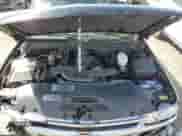 2003 Chevrolet Suburban with VIN 1GNFK16T83J218673, listed as a Copart auction lot 70991614 with 146,490 mi miles and Salvage title. Bid and sale history available at DreamBid. Image 11.