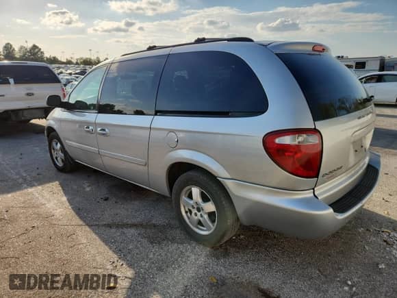 2007 Dodge Grand Caravan SXT with VIN 2D4GP44L37R345614, listed as a Copart auction lot 84979715 with 113,815 mi miles and Salvage title. Bid and sale history available at DreamBid. Image 2.